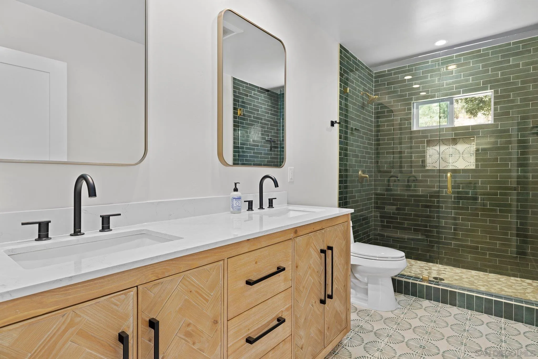 2686 Via Viejas Alpine, CA 91901 - Photo 27 of 55 a bathroom with a double vanity sink toilet and a mirror