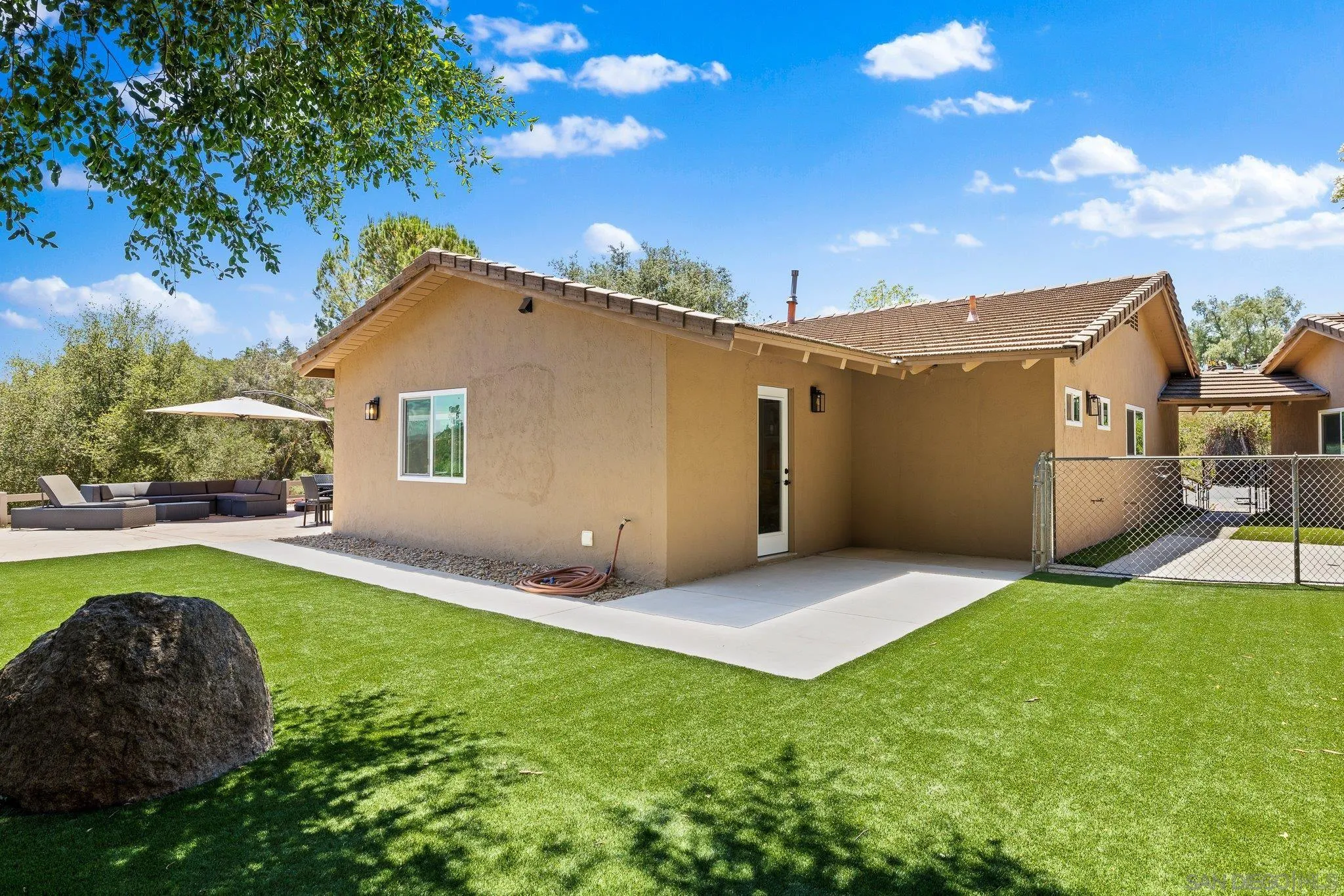 2686 Via Viejas Alpine, CA 91901 - Photo 34 of 55 a backyard of a house with table and chairs