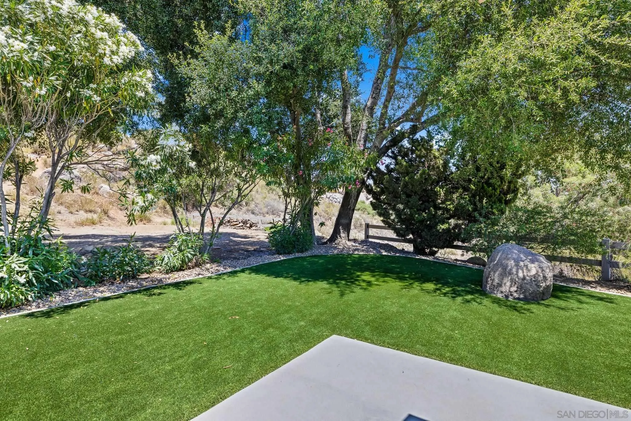 2686 Via Viejas Alpine, CA 91901 - Photo 35 of 55 a view of a backyard with large trees