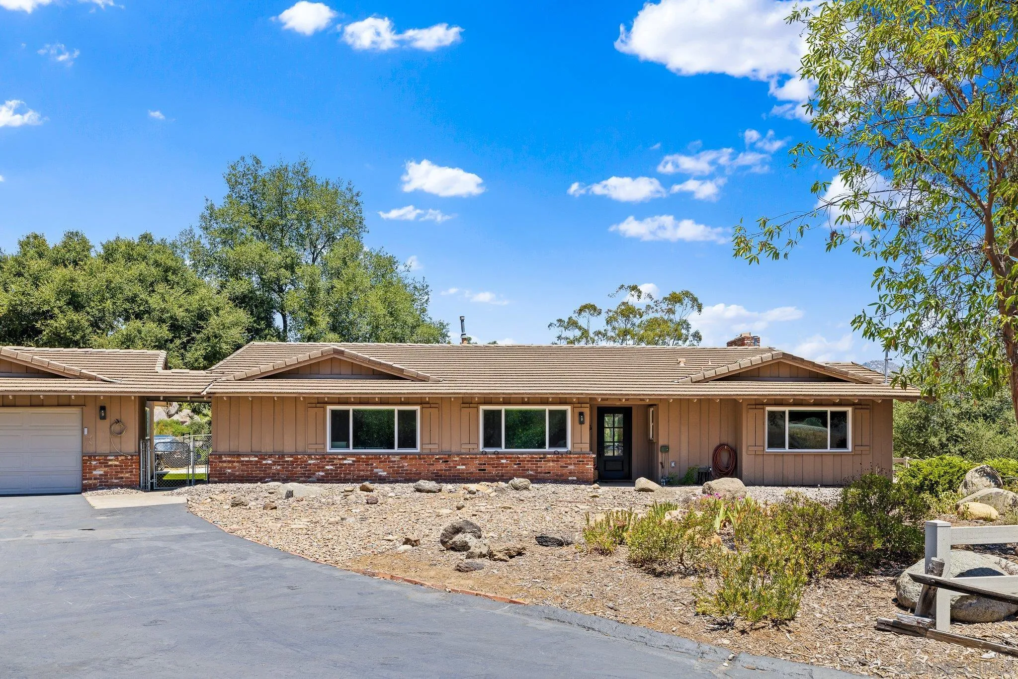 2686 Via Viejas Alpine, CA 91901 - Photo 43 of 55 a front view of a house with a yard