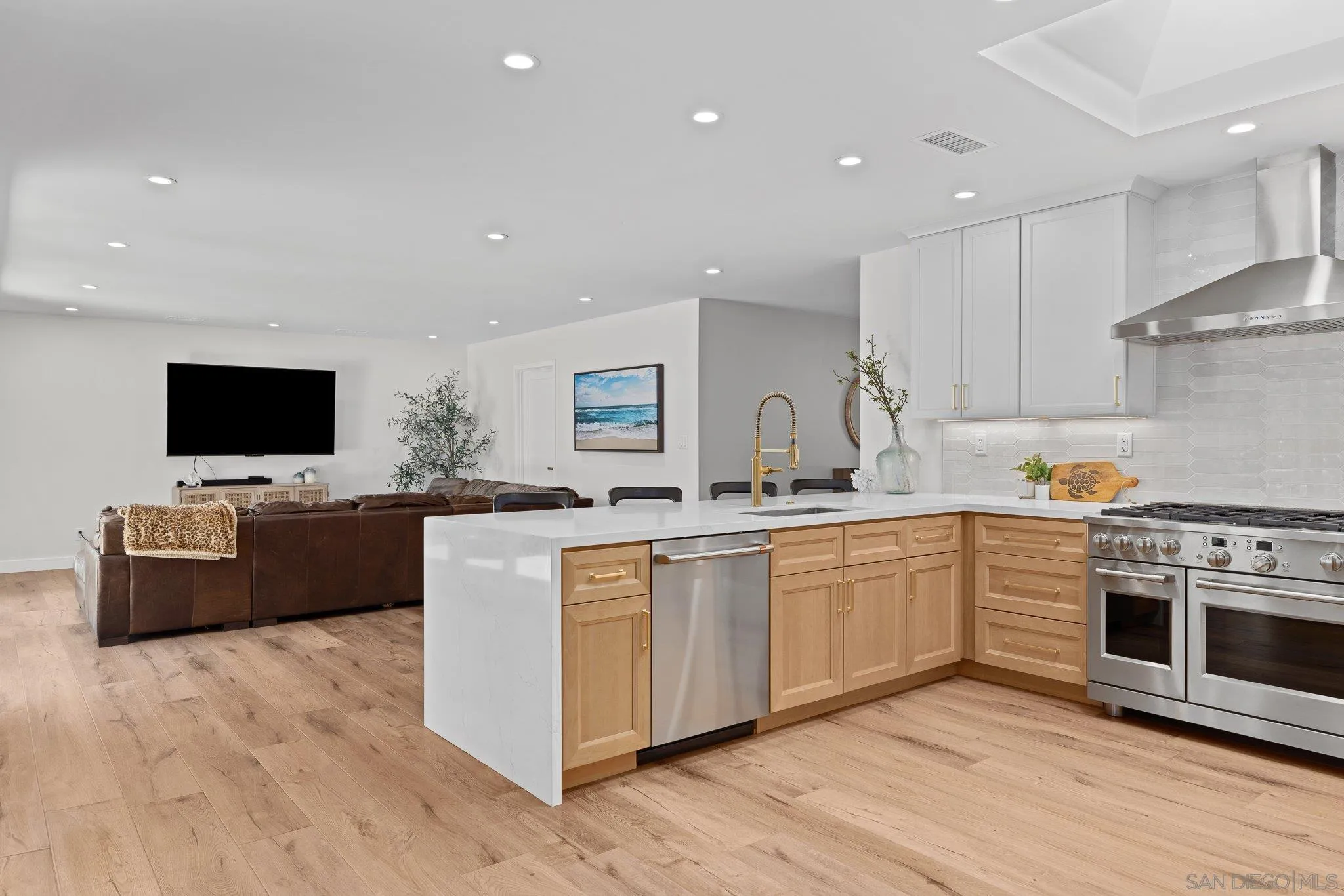 2686 Via Viejas Alpine, CA 91901 - Photo 6 of 55 a kitchen with stainless steel appliances kitchen island granite countertop a stove top oven and sink