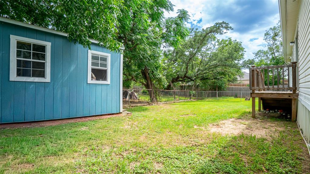 4501 Rhea Road Granbury, TX 76049 - Photo 27 of 29 View of backyard with large shed