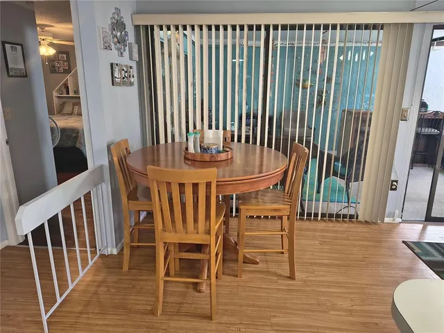 a bedroom with a bed window and a desk