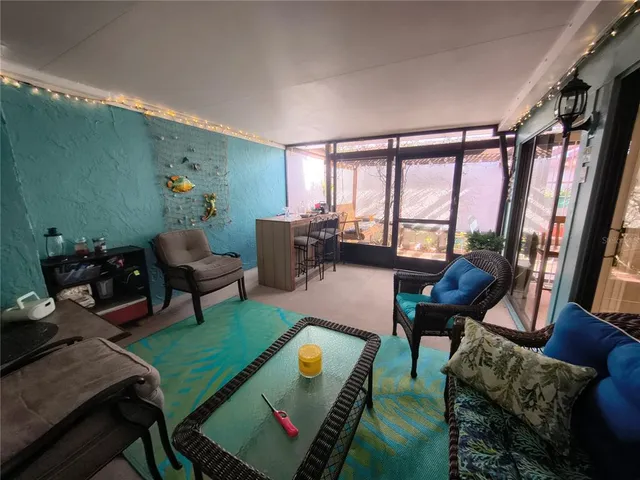 a white toilet sitting next to a bath tub