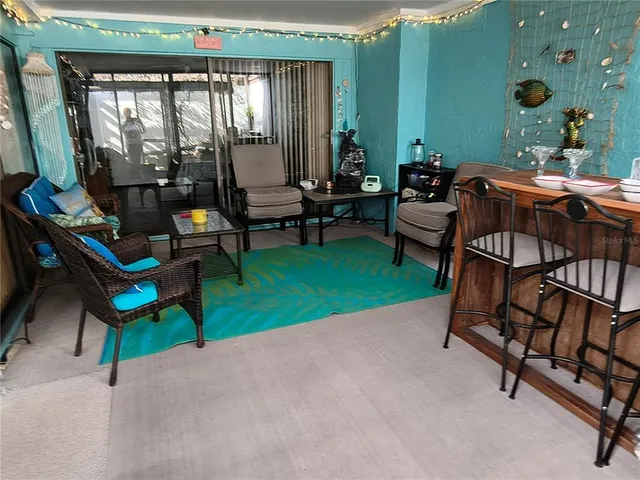 a bathroom with a sink and mirror with toilet