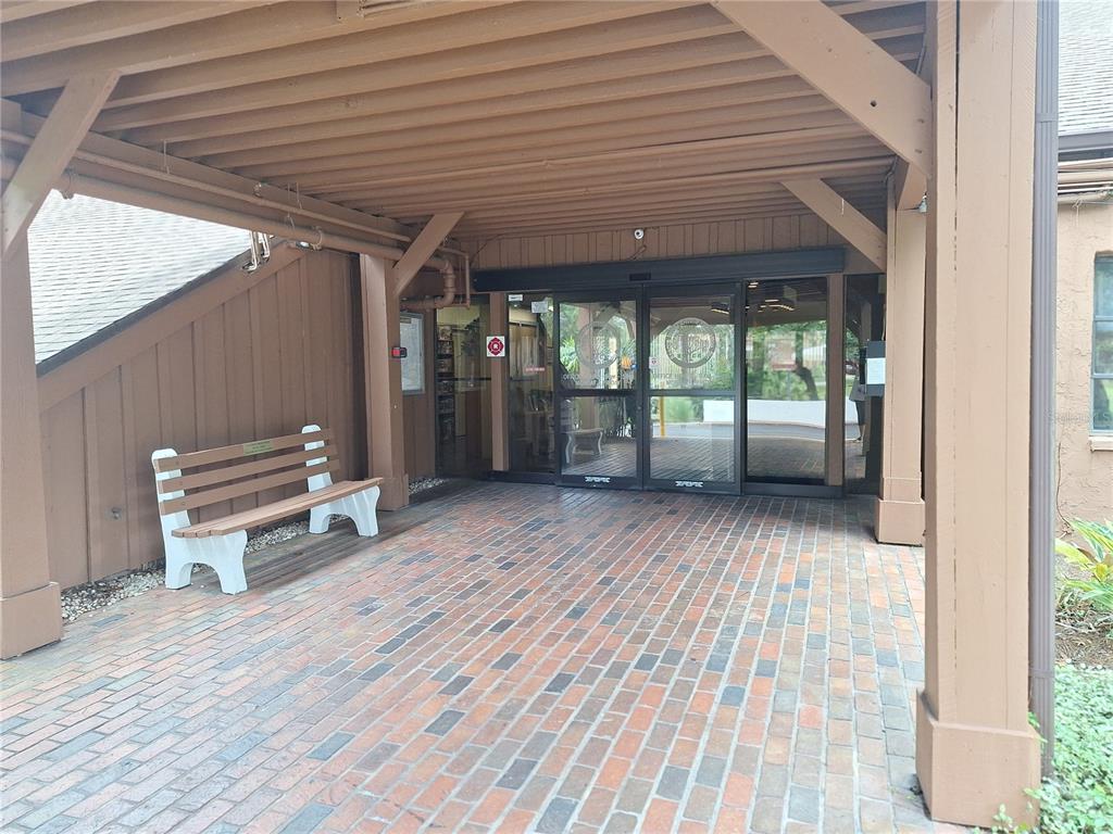 7519 Clanton Trail Hudson, FL 34667 - Photo 63 of 83 a view of livingroom with furniture and floor to ceiling window