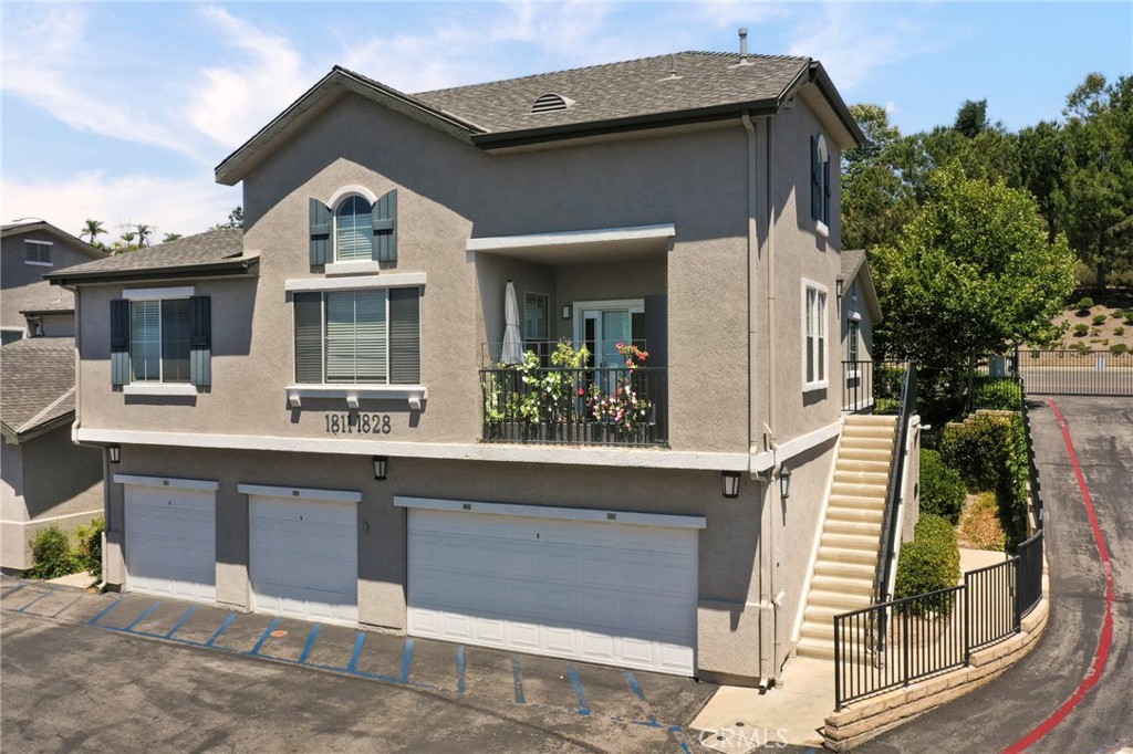 a front view of a house with a porch