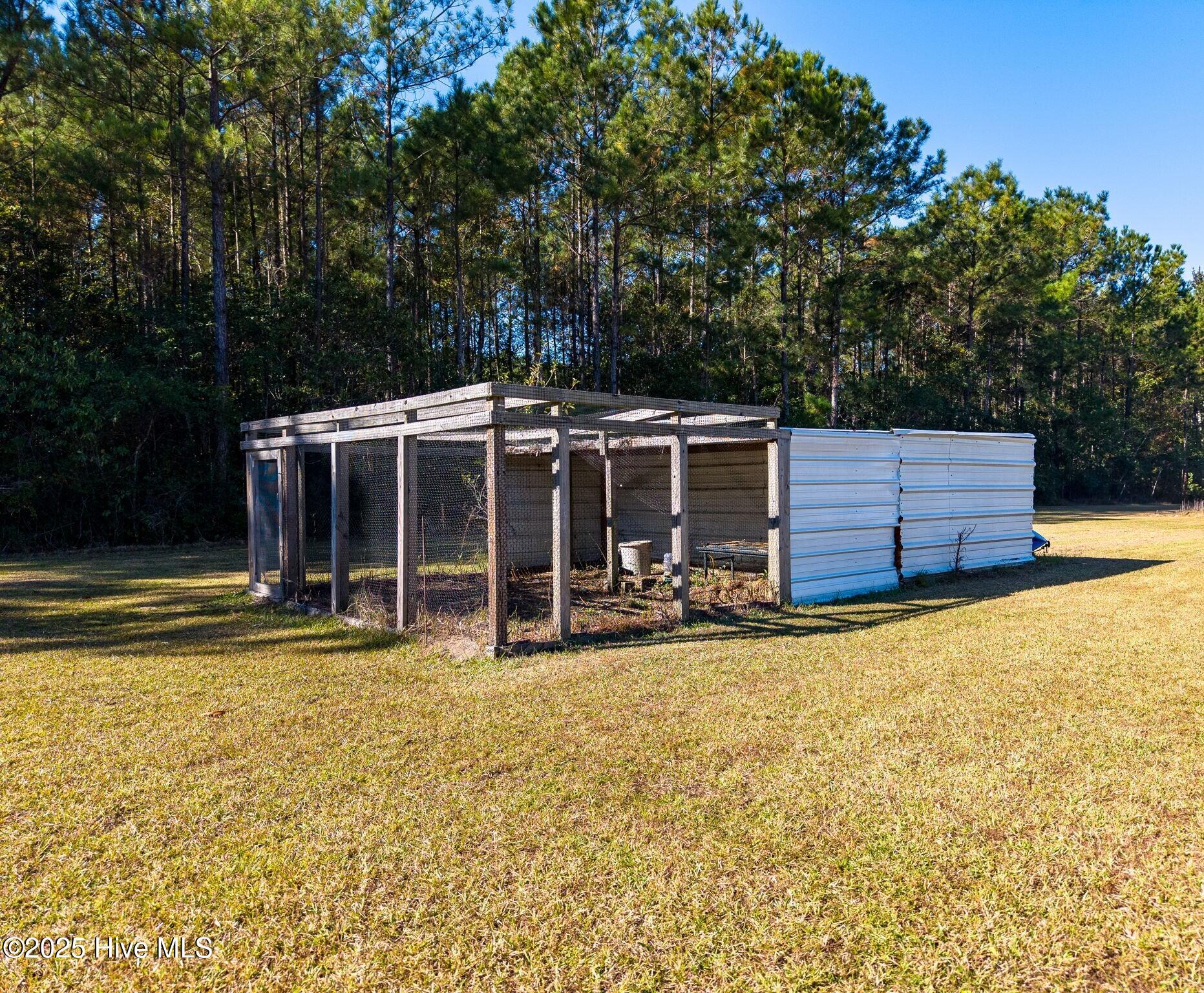 2580 Ash Little River Road Northwest Ash, NC 28420 - Photo 28 of 33 Chicken coop and storage