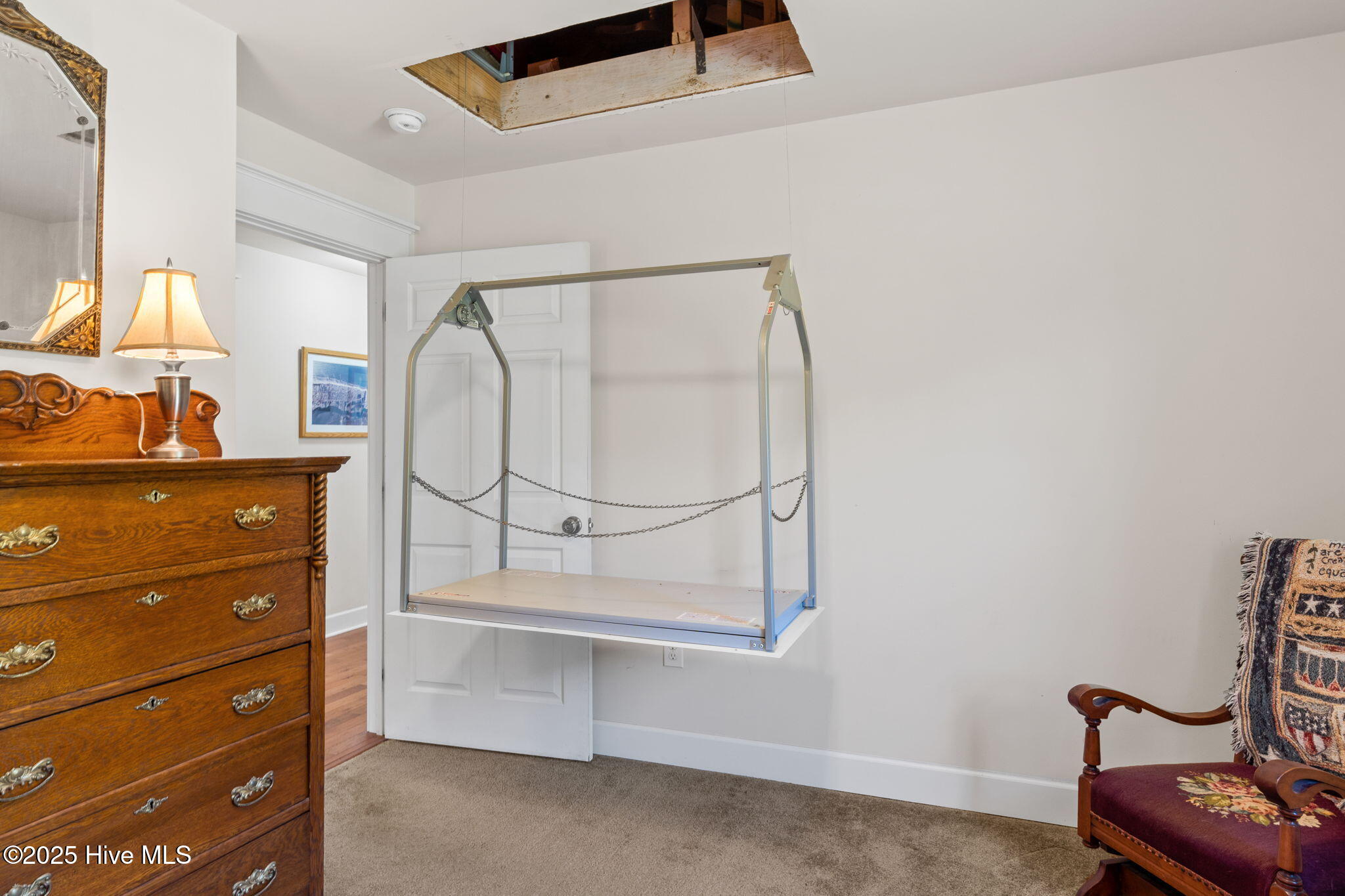 2580 Ash Little River Road Northwest Ash, NC 28420 - Photo 8 of 33 Guest Bedroom 2 with dumbwaiter to the attic