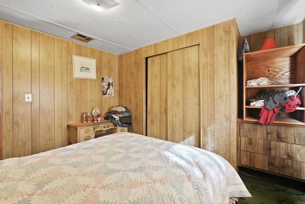 40645 Sage Road Hemet, CA 92544 - Photo 11 of 70 a bedroom with a bed and a closet