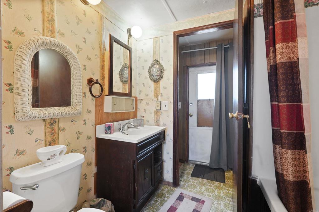 40645 Sage Road Hemet, CA 92544 - Photo 12 of 70 a bathroom with a sink toilet and shower