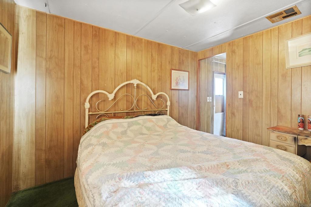 40645 Sage Road Hemet, CA 92544 - Photo 17 of 70 a large bed sitting in a bedroom next to a window