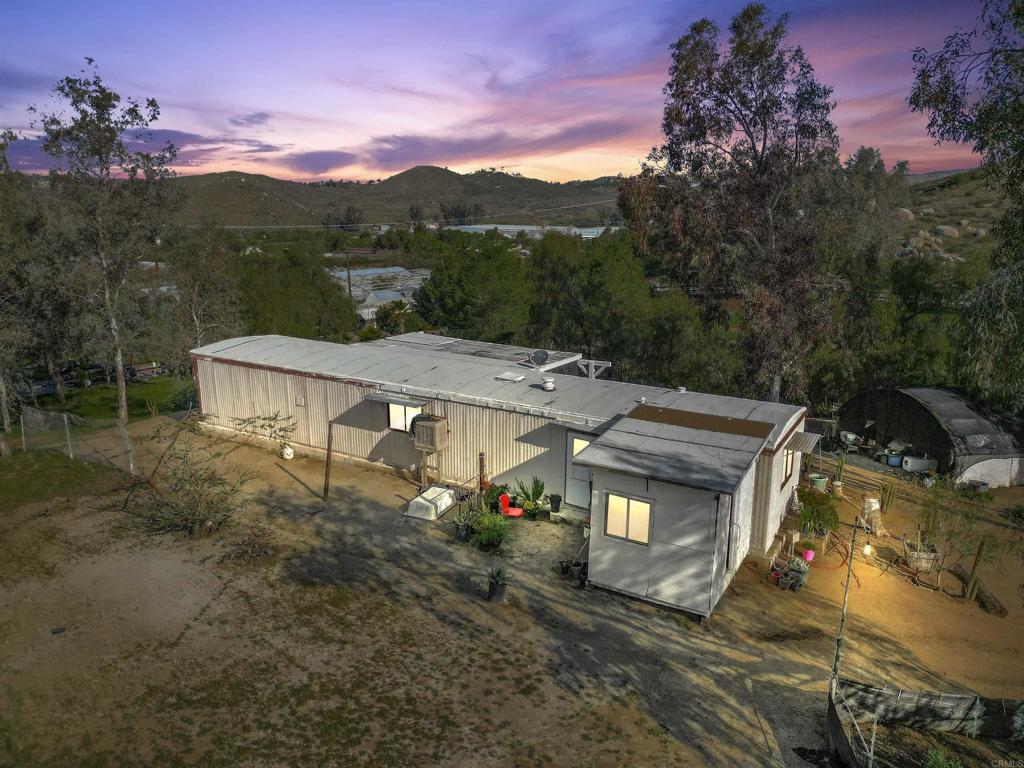40645 Sage Road Hemet, CA 92544 - Photo 3 of 70 a view of a big house with a big yard