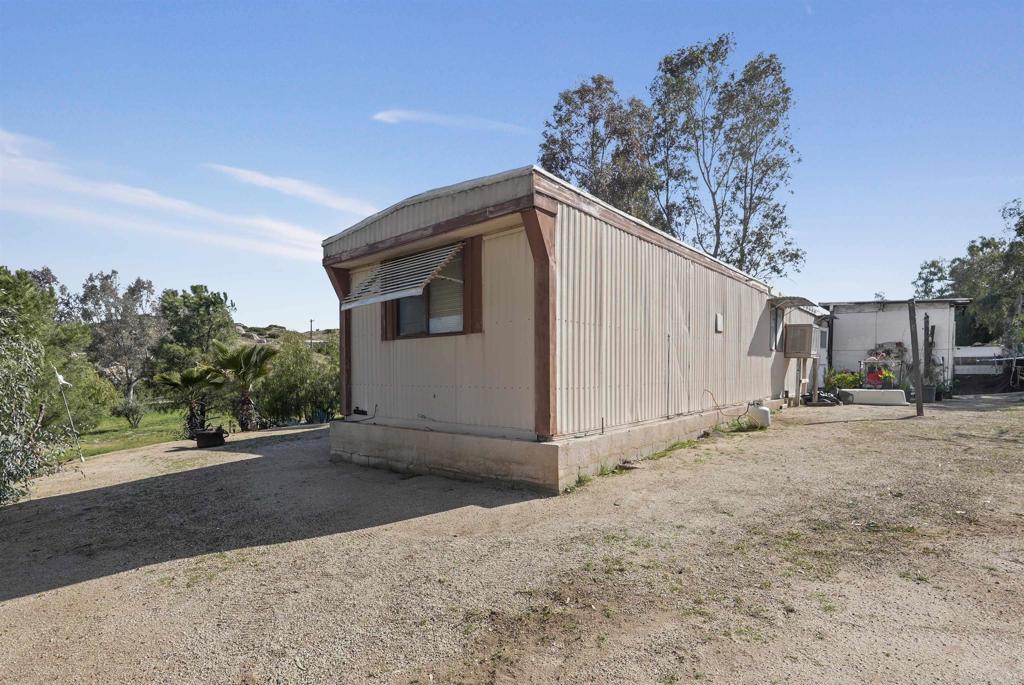 40645 Sage Road Hemet, CA 92544 - Photo 39 of 70 a view of a house with a backyard