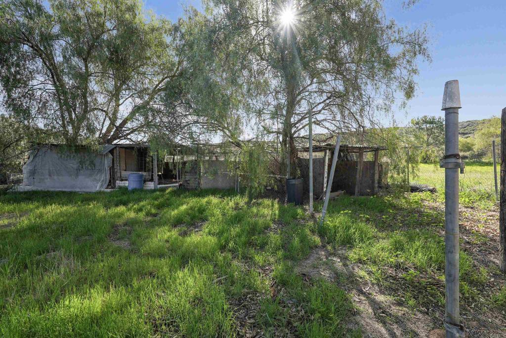 40645 Sage Road Hemet, CA 92544 - Photo 52 of 70 a view of a house with a yard and tree s