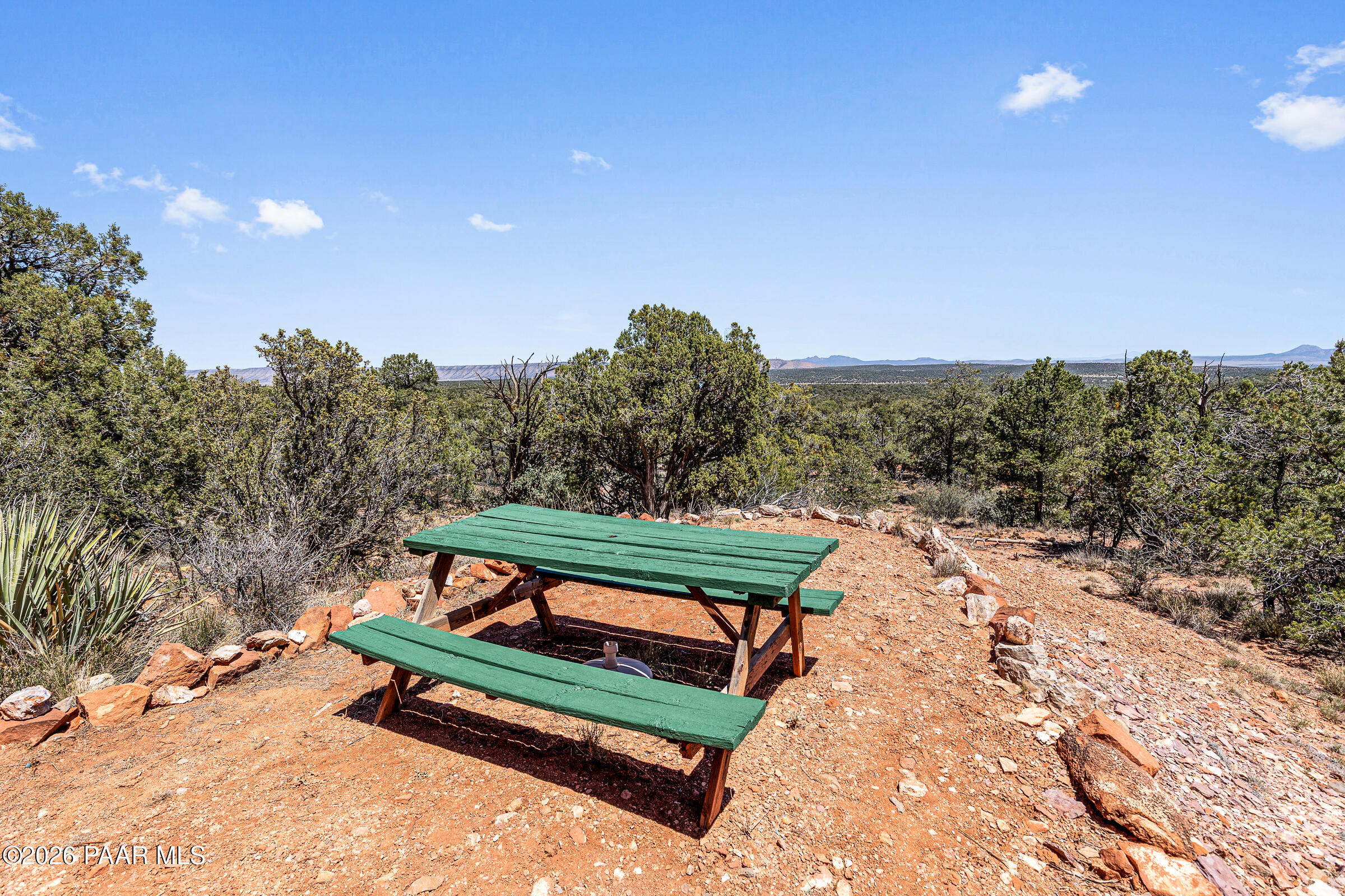 33749 West Whiskey River Road, Unit 21 Seligman, AZ 86337 - Photo 33 of 41 a park view with a bench