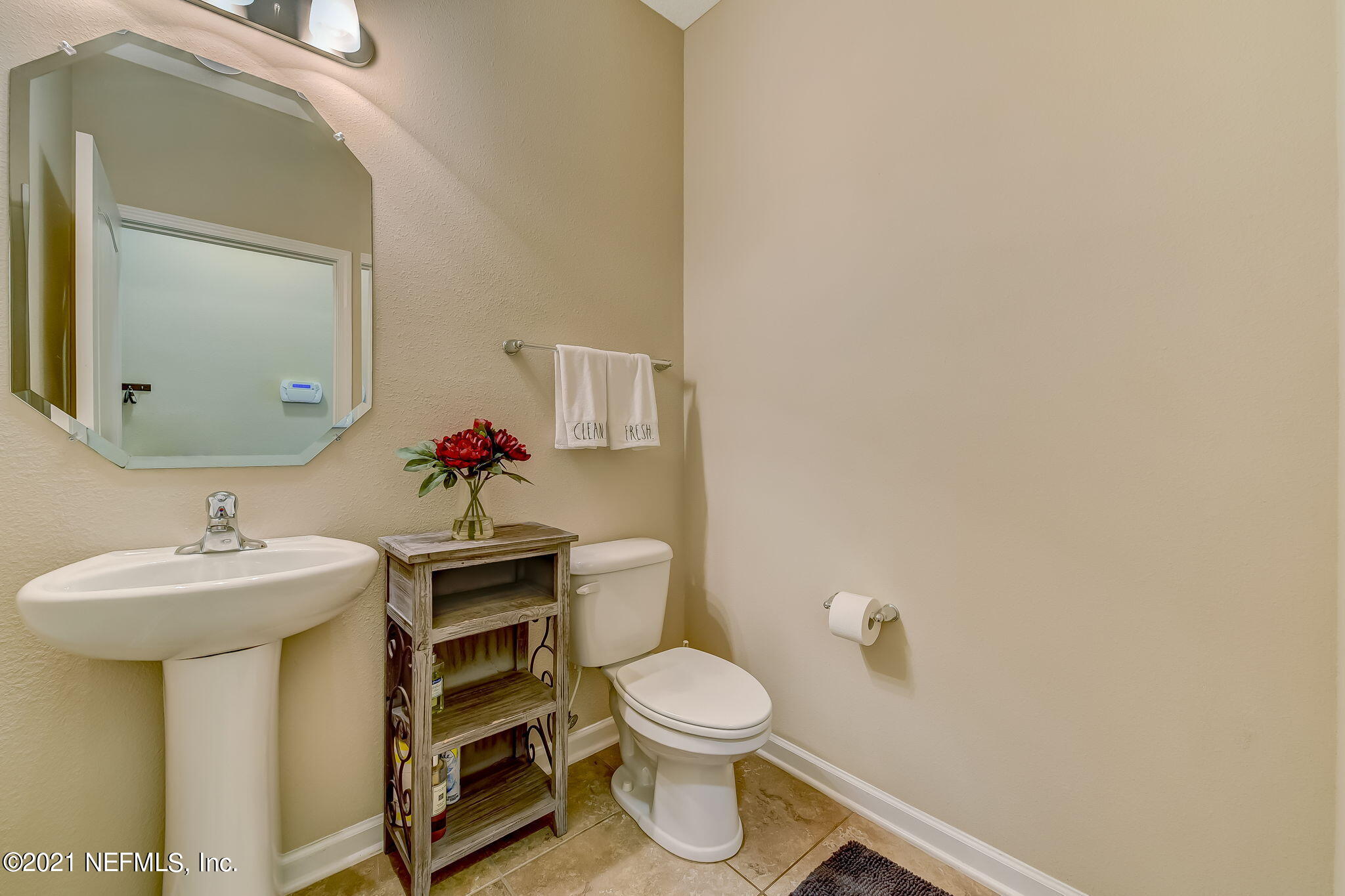 97254 Bluff View Circle Yulee, FL 32097 - Photo 12 of 34 a bathroom with a sink mirror and toilet