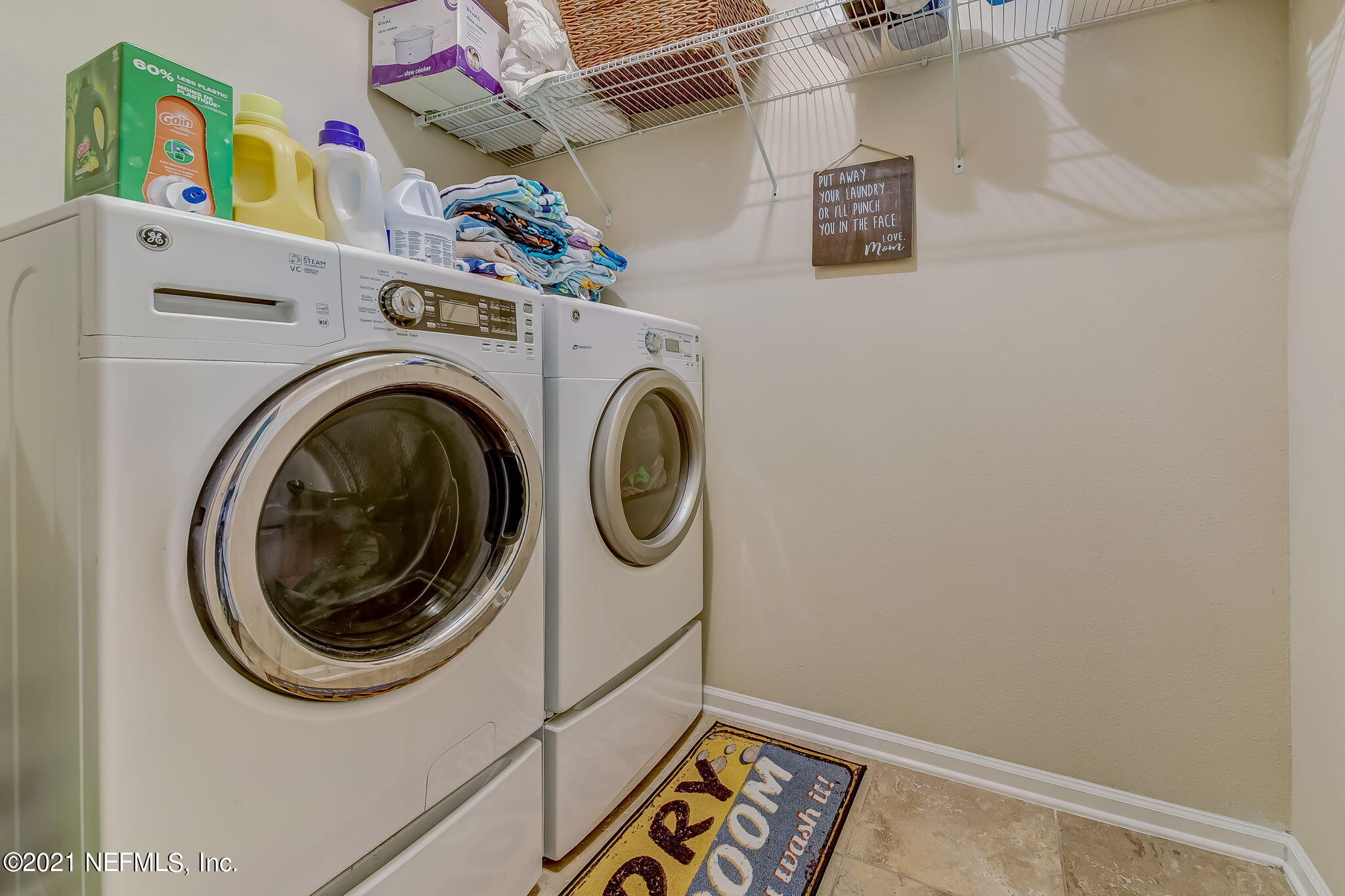 97254 Bluff View Circle Yulee, FL 32097 - Photo 13 of 34 a utility room with dryer and washer