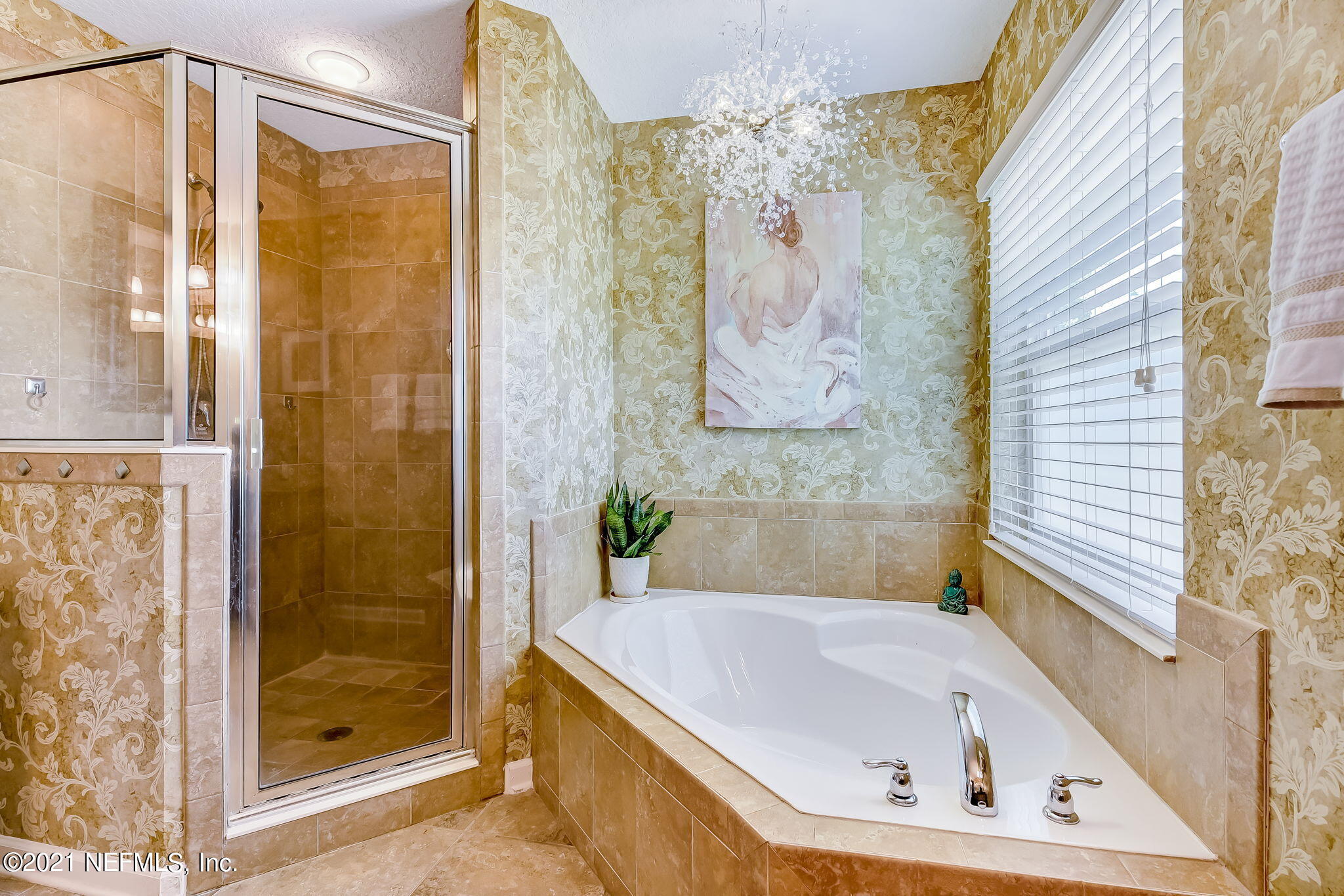 97254 Bluff View Circle Yulee, FL 32097 - Photo 17 of 34 a bathroom with a tub and shower