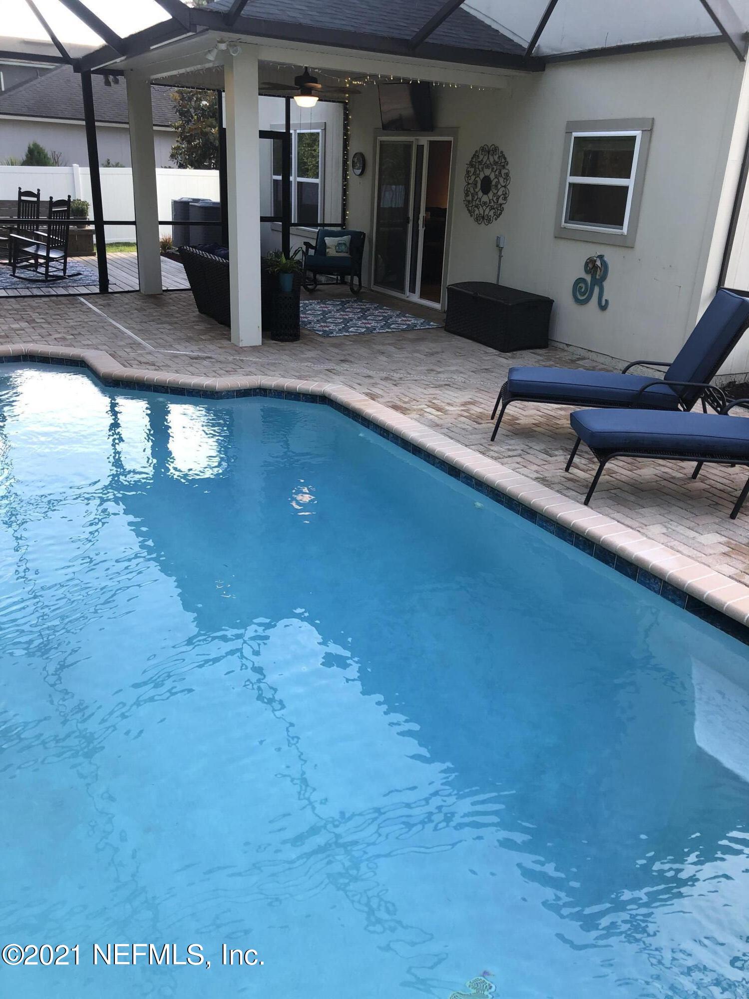 97254 Bluff View Circle Yulee, FL 32097 - Photo 27 of 34 a view of a room with gym equipment