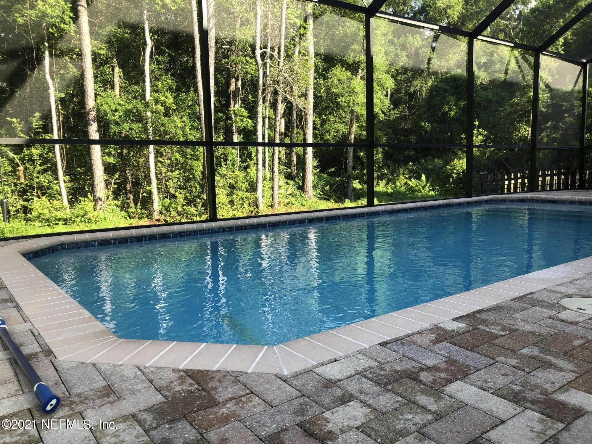 97254 Bluff View Circle Yulee, FL 32097 - Photo 28 of 34 a view of a lake from a balcony