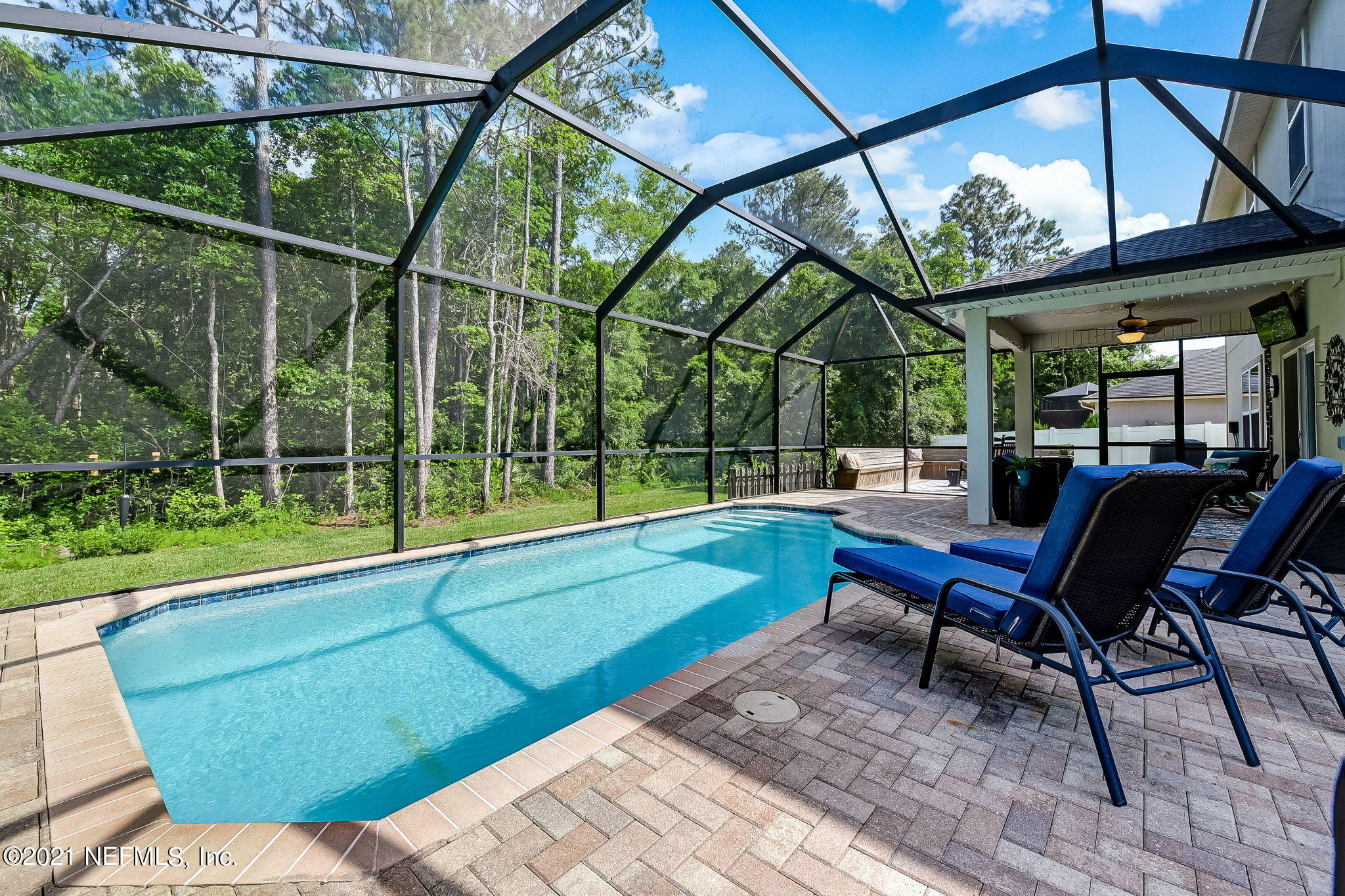 97254 Bluff View Circle Yulee, FL 32097 - Photo 29 of 34 a view of a yard with a table and chairs