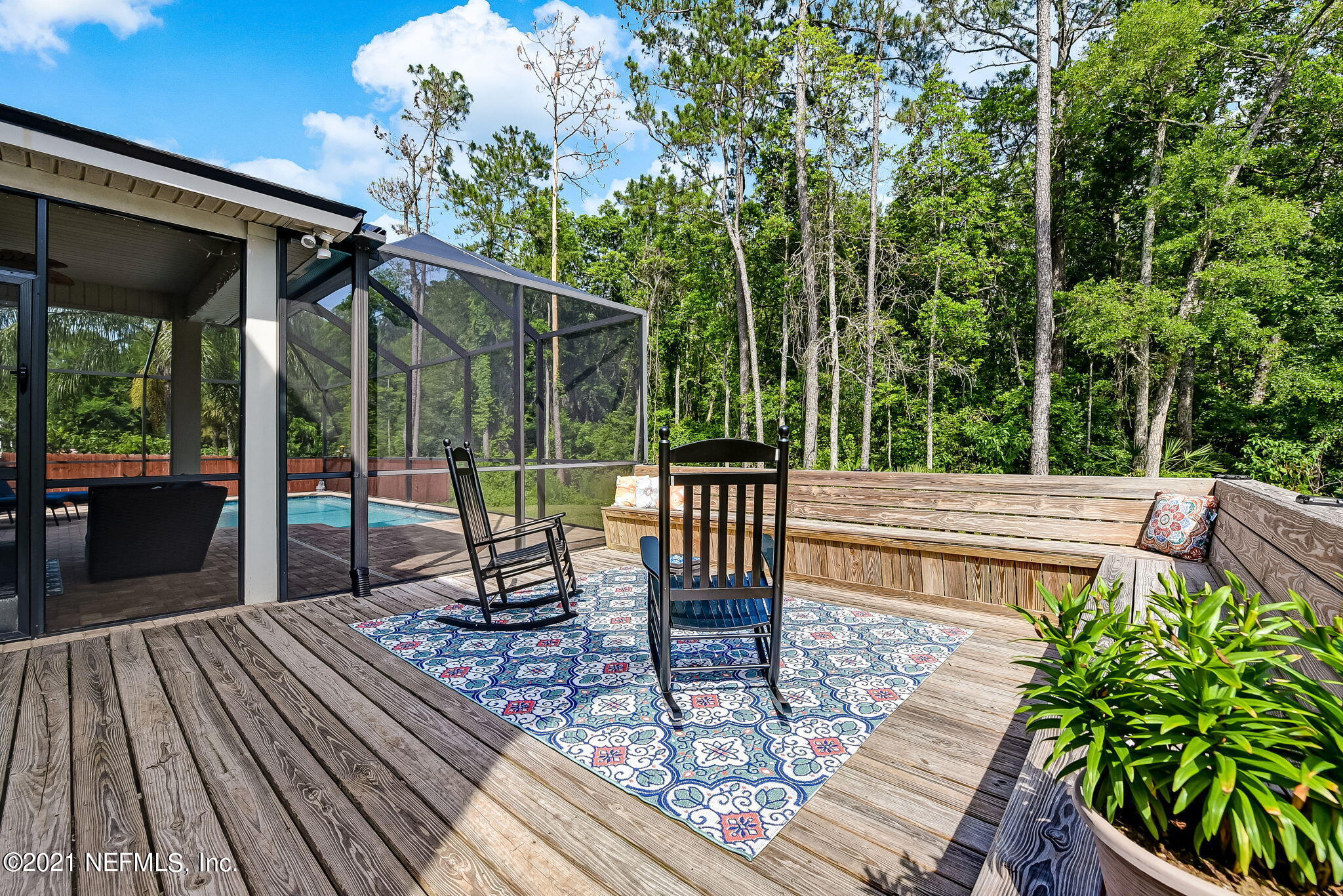 97254 Bluff View Circle Yulee, FL 32097 - Photo 33 of 34 a view of a chairs and tables on the wooden floor