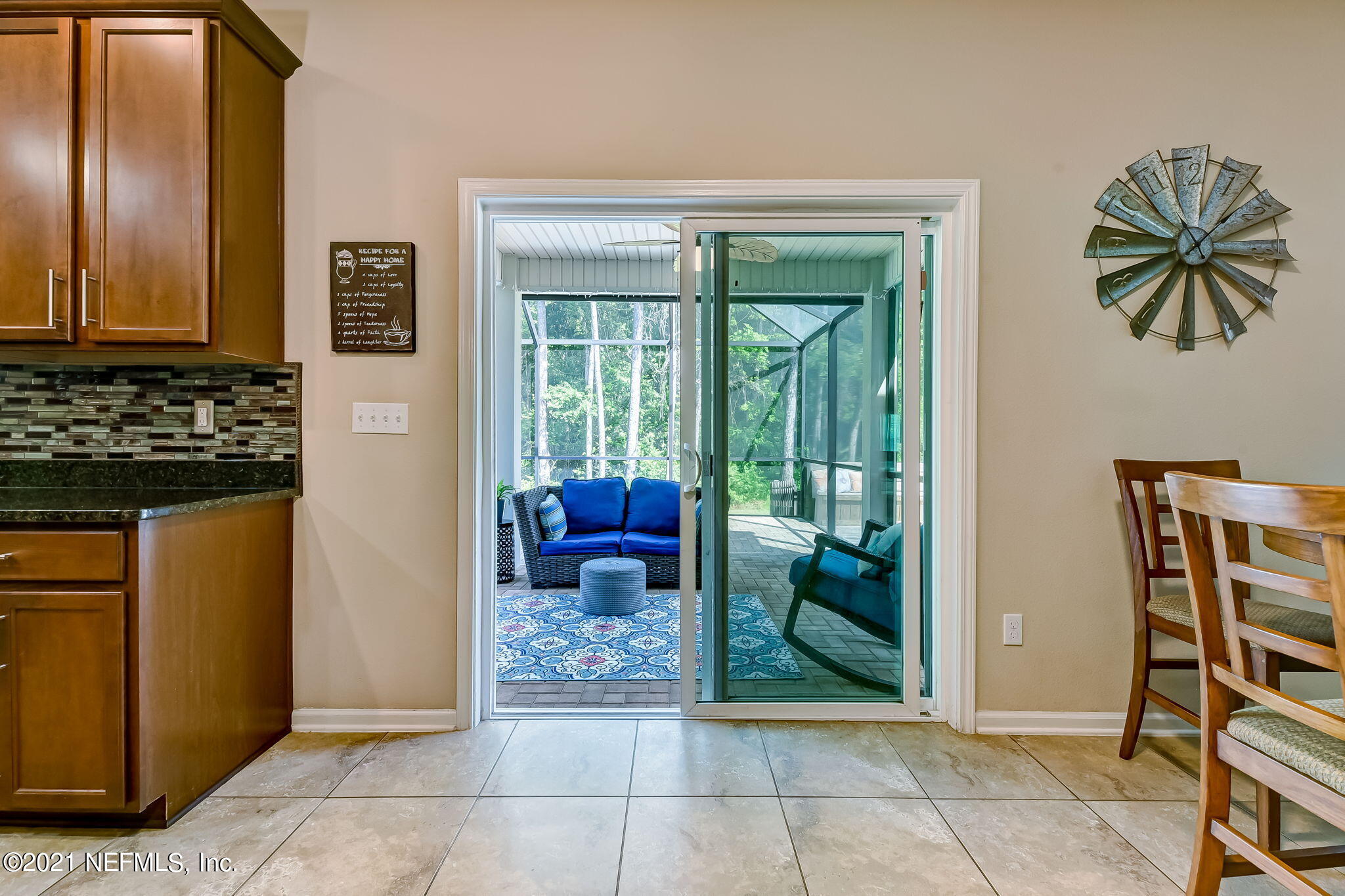 97254 Bluff View Circle Yulee, FL 32097 - Photo 9 of 34 a view of a livingroom with furniture and front door