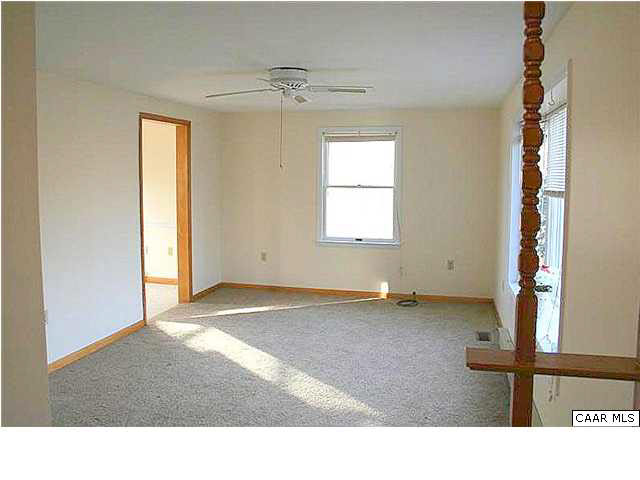 89 Gaar Mountain Road Madison, VA 22727 - Photo 8 of 26 a room with a window and a table
