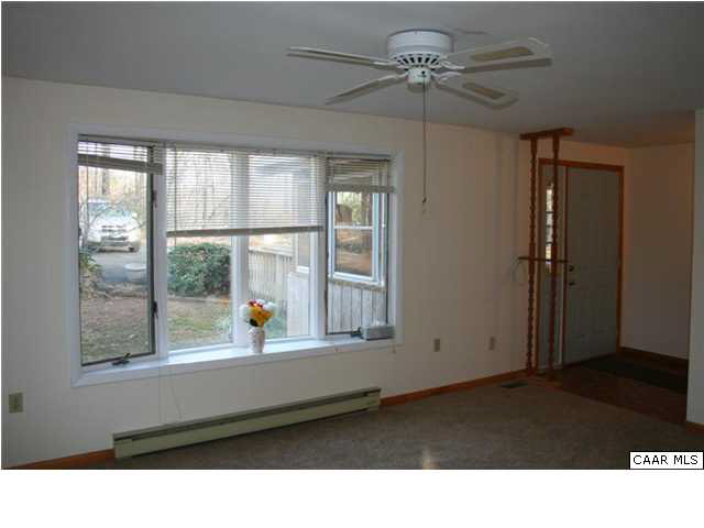 89 Gaar Mountain Road Madison, VA 22727 - Photo 9 of 26 a black and white photo of a living room