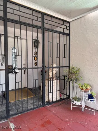 a view of a porch with furniture