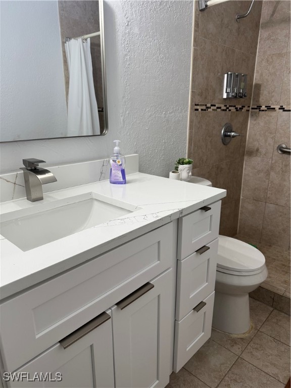 806 West 80th Place Hialeah, FL 33014 - Photo 12 of 17 a bathroom with a sink toilet and mirror