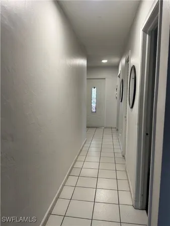 a living room with a couch and a flat screen tv