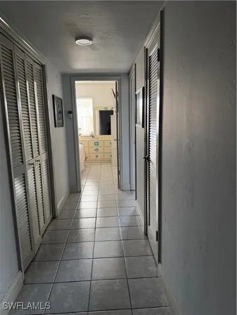 a bedroom with an bed and lamp