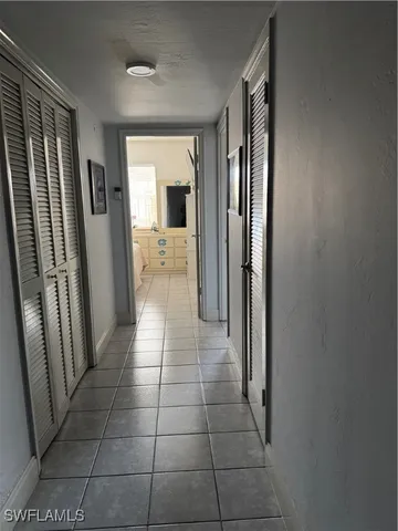 a bedroom with an bed and lamp