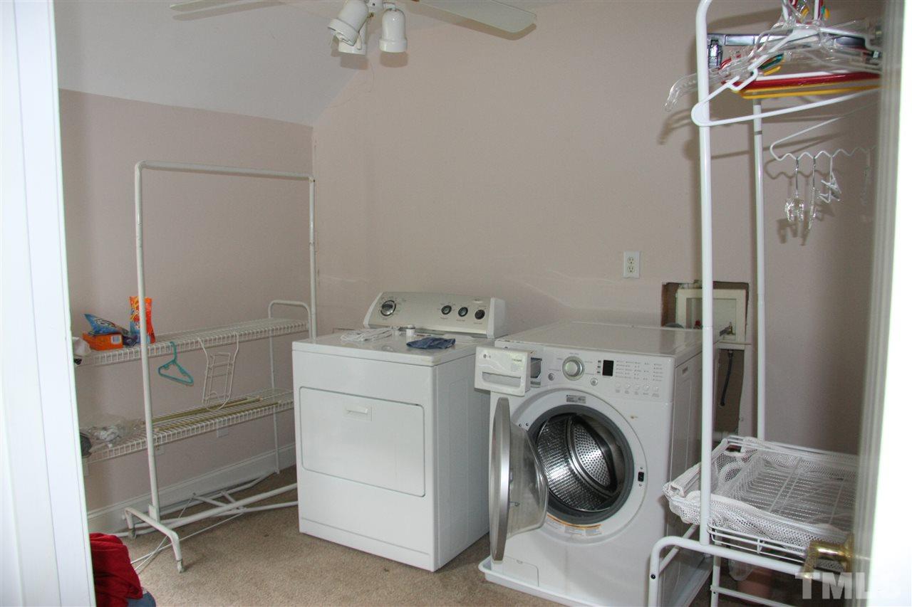 232 Release Circle Raleigh, NC 27615 - Photo 18 of 23 a utility room with dryer and washer
