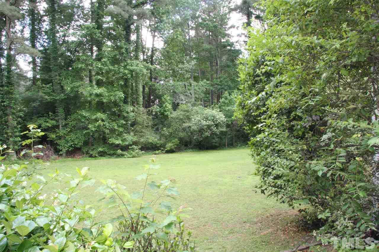 232 Release Circle Raleigh, NC 27615 - Photo 22 of 23 a view of a yard with a tree