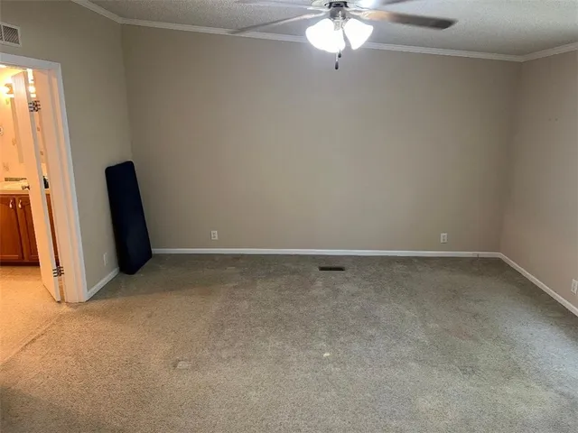 a bathroom with a sink a mirror and a shower