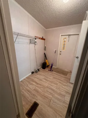 a view of a livingroom with furniture and windows