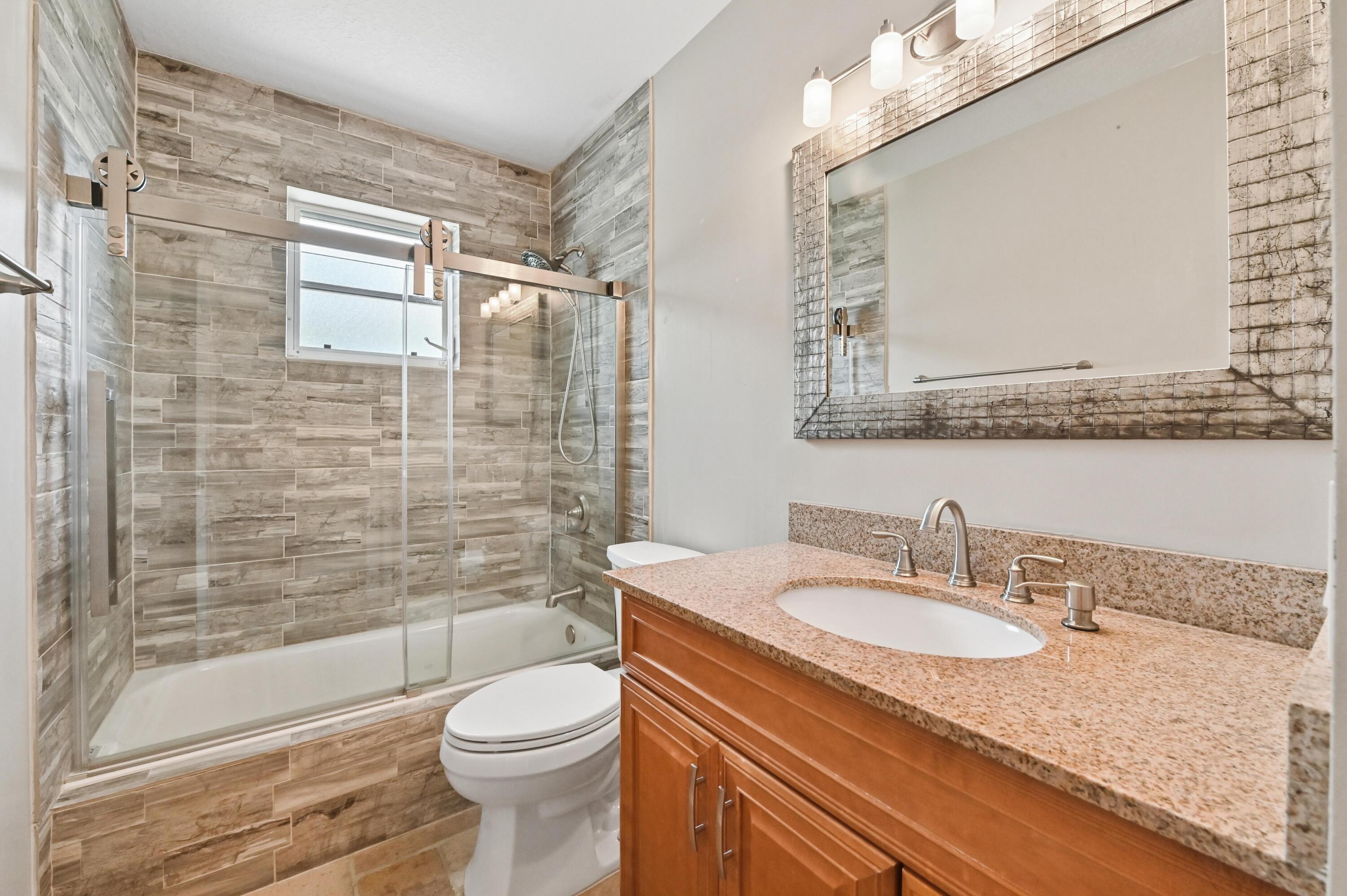 1163 Peninsula Way Greenacres, FL 33413 - Photo 25 of 40 23 Bathroom 01