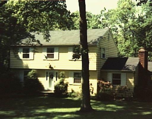 38 Tannery Hill Road Ridgefield, CT 06877 - Photo 1 of 1 a front view of a house with yard