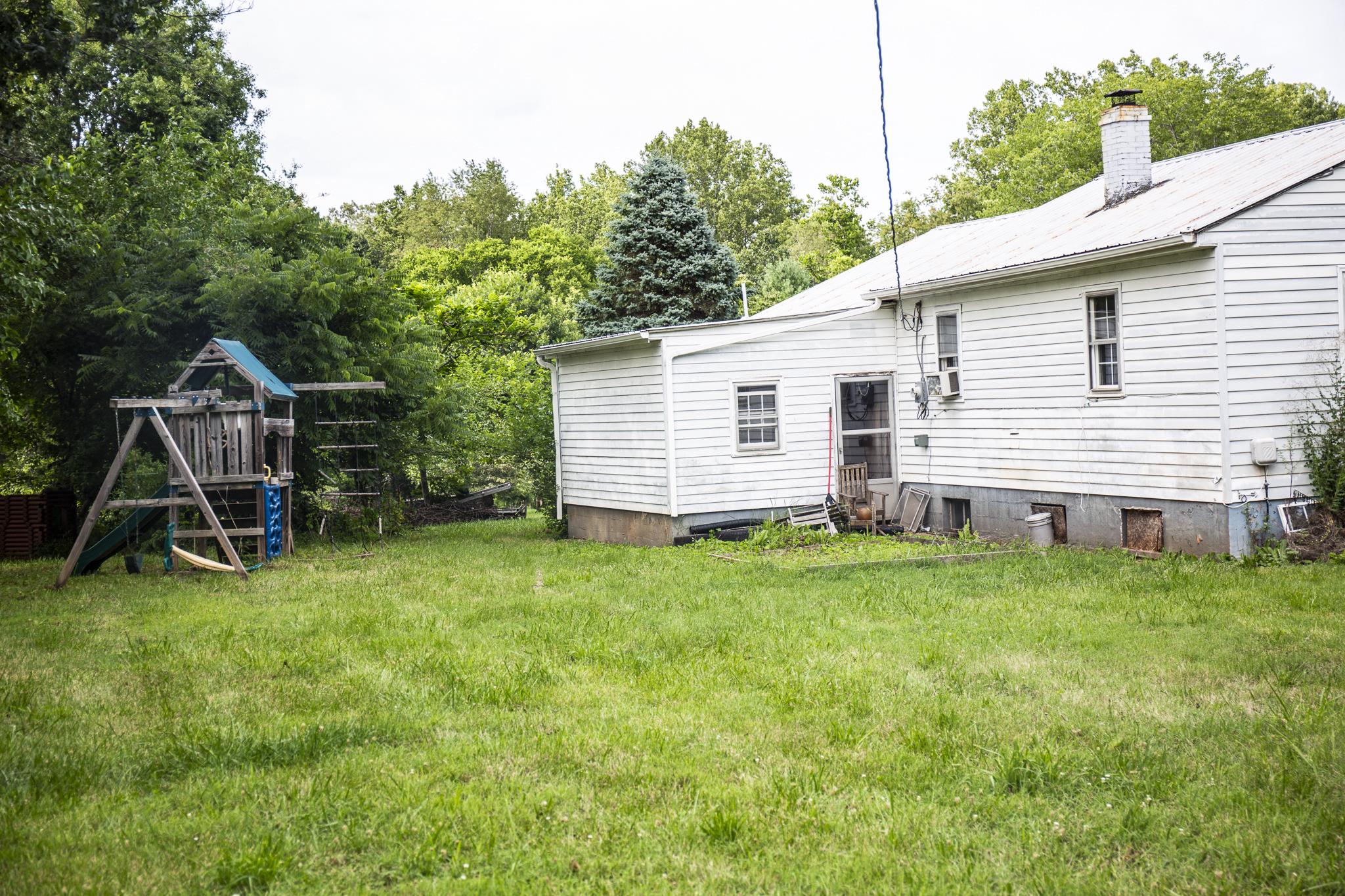 15120 Jefferies Mill Road Culpeper, VA 22701 - Photo 35 of 38 Spacious backyard with playset charm.