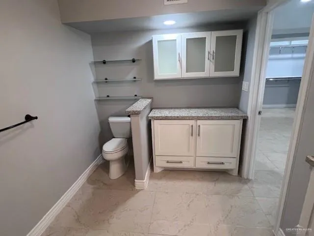 a bathroom with a toilet