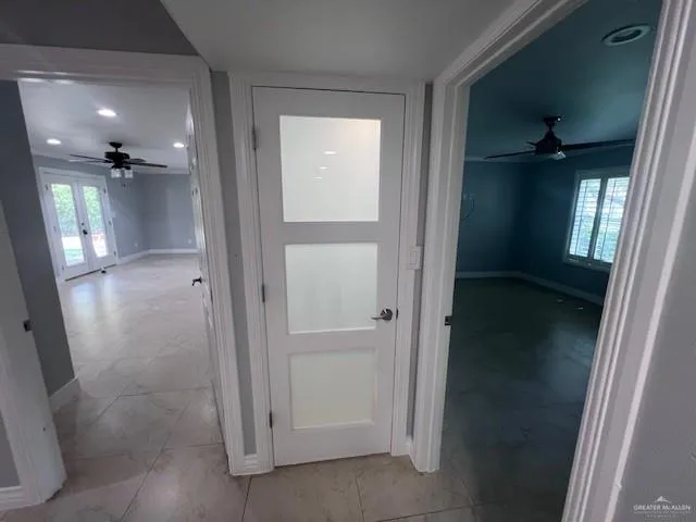 a view of an empty room with a window