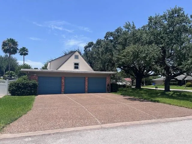 a swimming pool with outdoor seating and yard