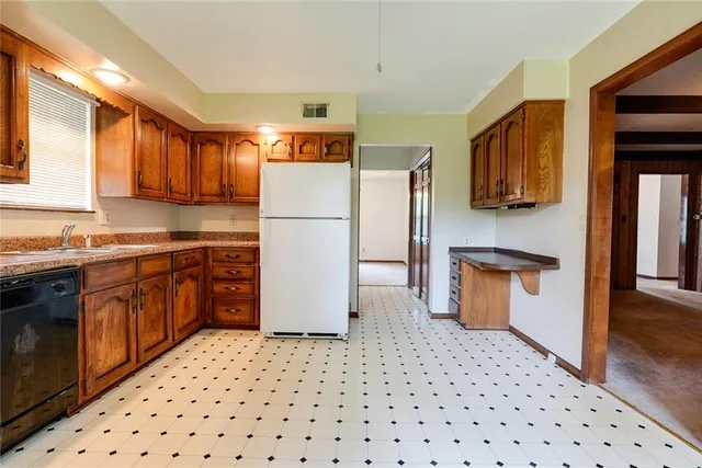 $325,000 | 1104 Southwest Mic-O-Say Drive, Blue Springs, MO 64015