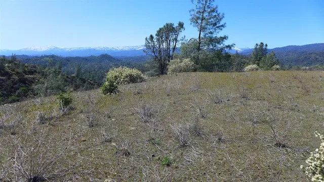 a view of a mountain with an outdoor space