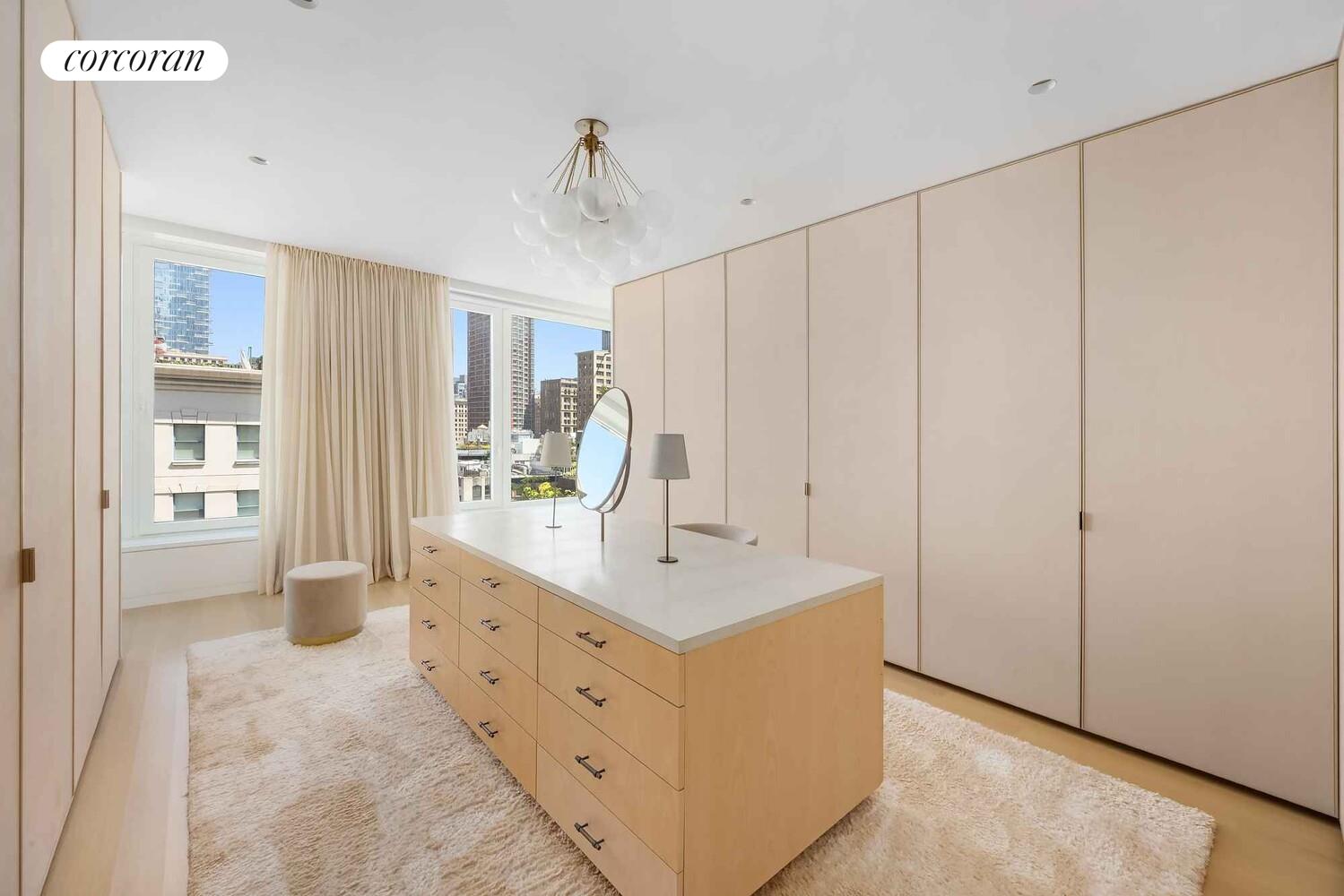 37 Warren Street, Unit PHCD Manhattan, NY 10007 - Photo 11 of 23 a bathroom with a double vanity sink and mirror