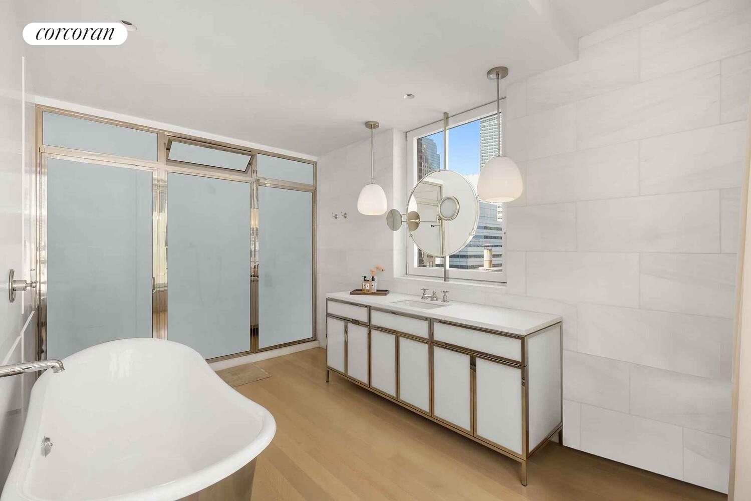 37 Warren Street, Unit PHCD Manhattan, NY 10007 - Photo 12 of 23 a bathroom with a double vanity sink mirror and shower