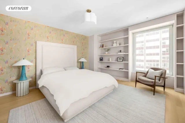 a bedroom with a bed and a couch